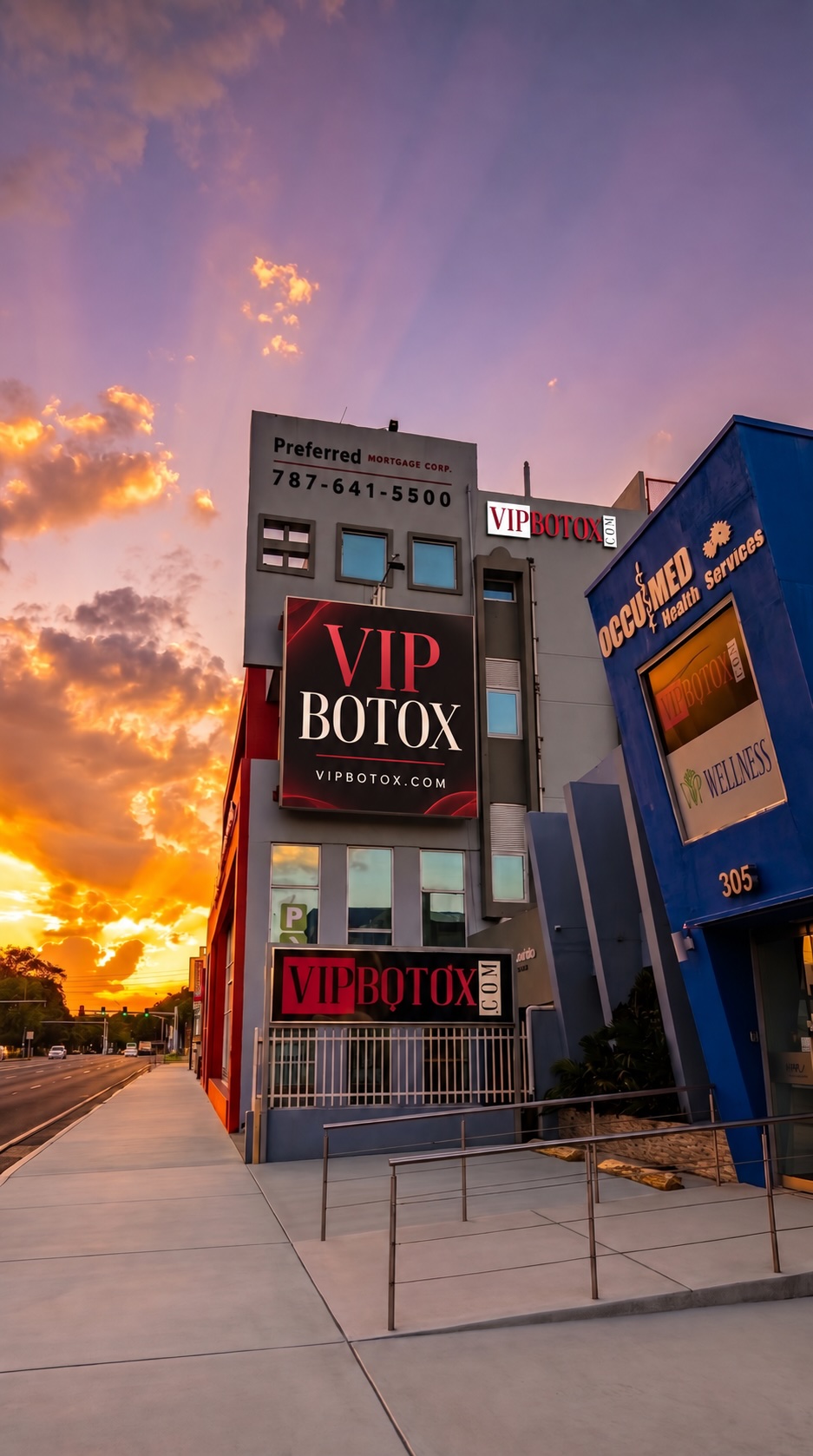 VIP Botox exterior at sunset, with the VIPBOTOX signs and street entrance visible